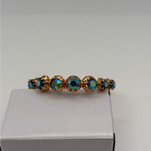 Vintage TRIAD bracelet with blue iridescent. Stones